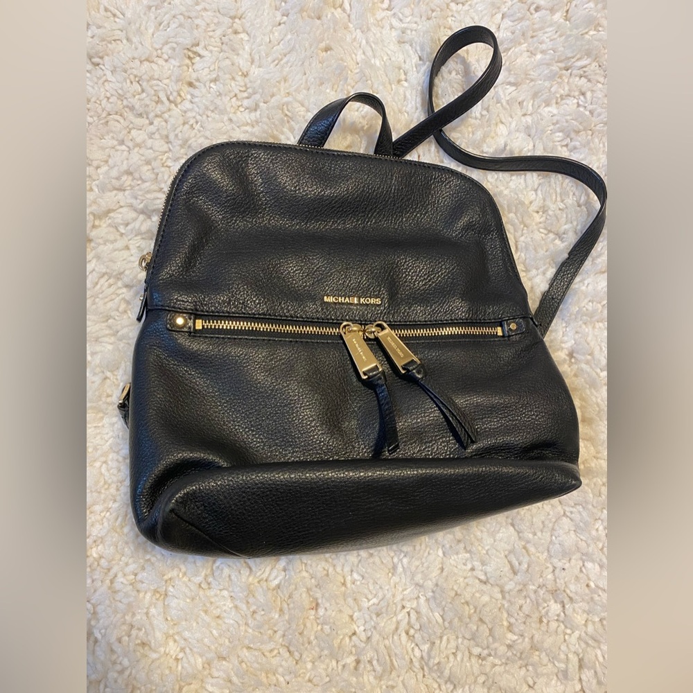 Michael Kors black leather backpack. Great condition.